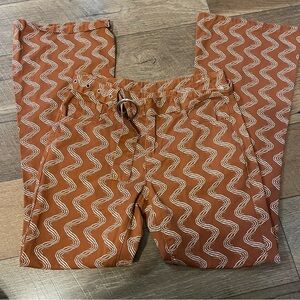 Milk It Coastal Cowgirl Funky 70s Burnt Orange And White Wide Leg Pants C7